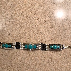 Turquoise, gold, pearl, and black beaded bracelet